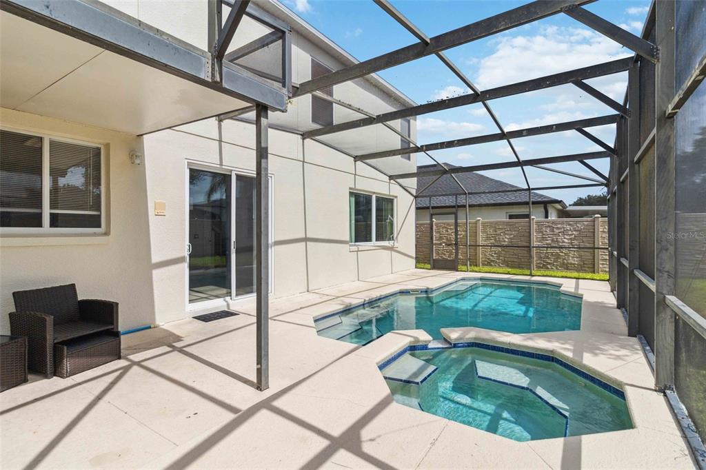 2881 Lyndscape Street Orlando, FL 32833 - Photo 22 of 30 a view of a backyard