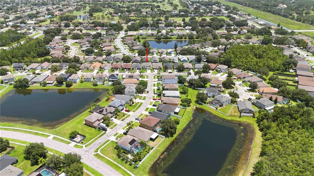 2881 Lyndscape Street Orlando, FL 32833 - Photo 23 of 30 an aerial view of residential houses with outdoor space