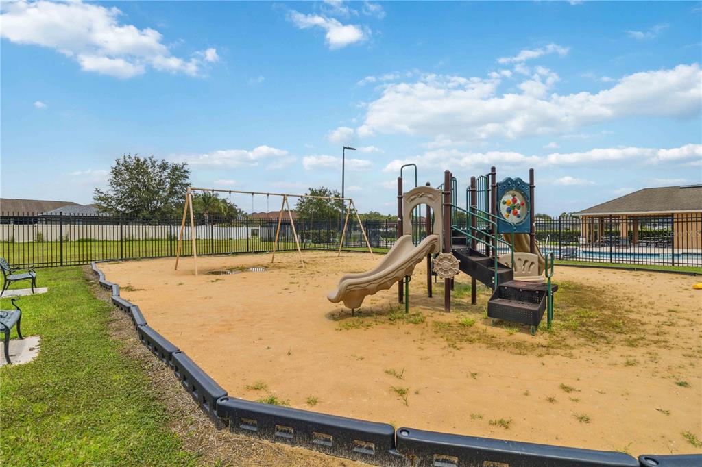 2881 Lyndscape Street Orlando, FL 32833 - Photo 27 of 30 swimming pool with outdoor seating