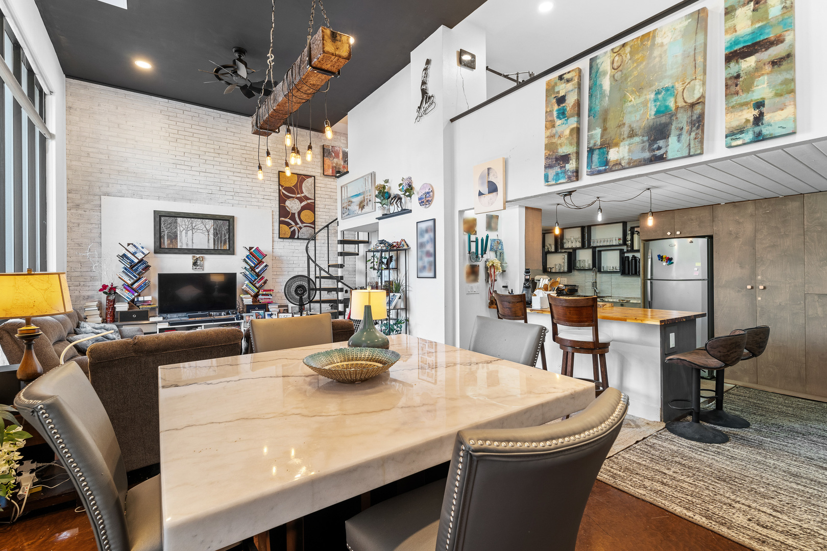 40 North Tower Road, Unit 1E Oak Brook, IL 60523 - Photo 2 of 16 a view of a dining room with furniture and a fireplace