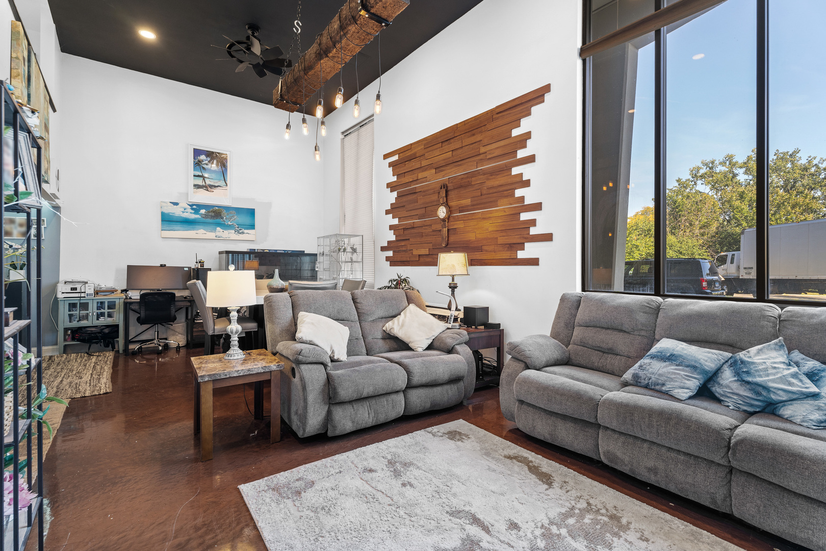 40 North Tower Road, Unit 1E Oak Brook, IL 60523 - Photo 8 of 16 a living room with furniture wooden floor and a large window