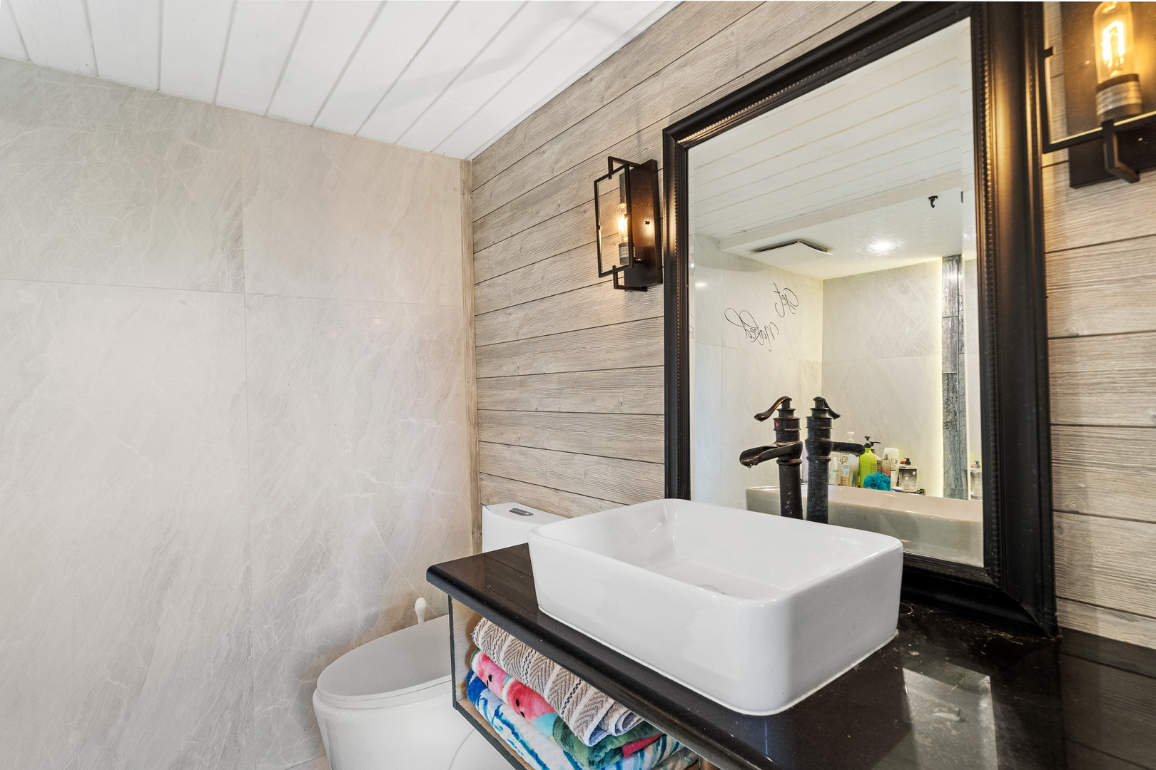 40 North Tower Road, Unit 1E Oak Brook, IL 60523 - Photo 9 of 16 a bathroom with a sink and a mirror