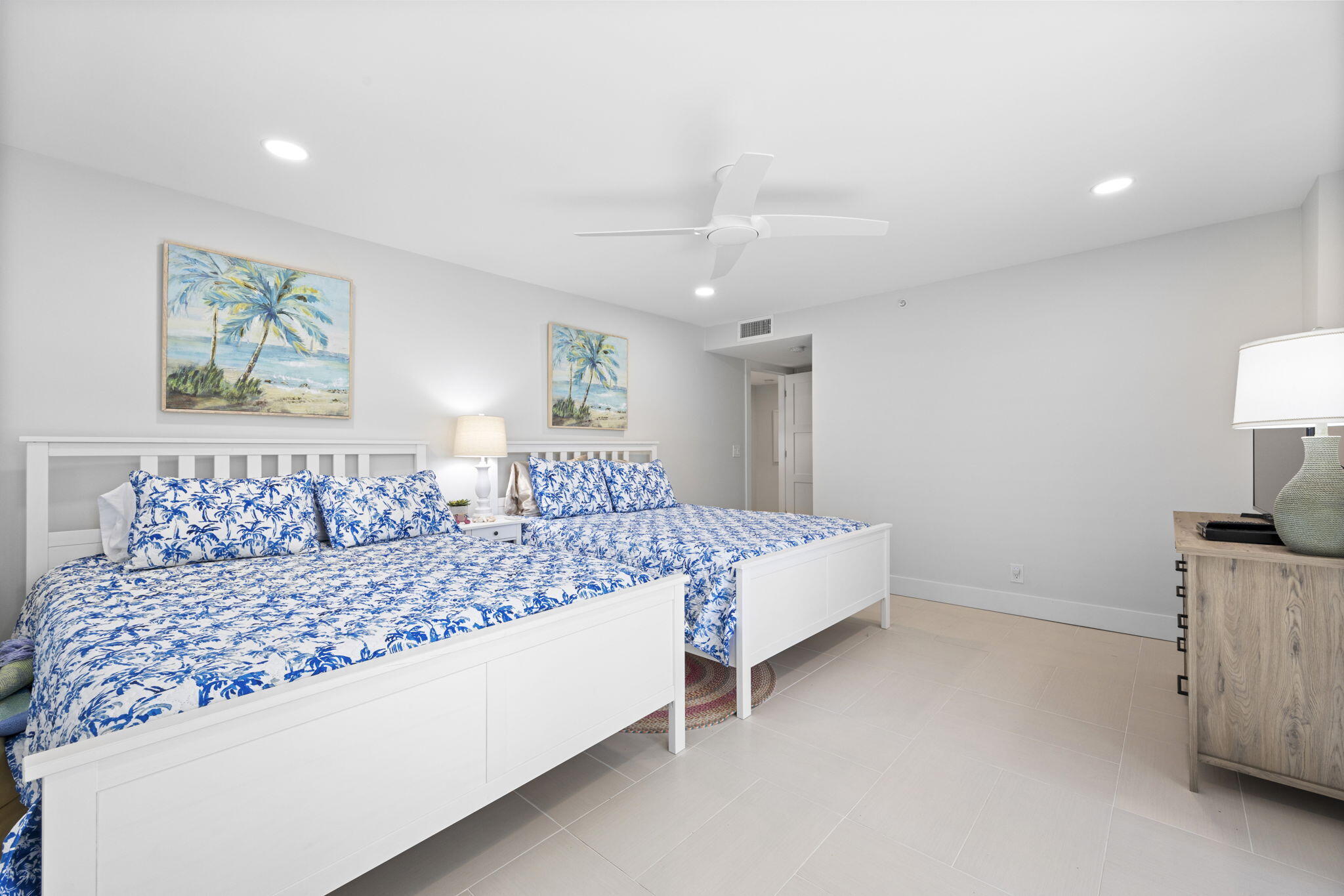 500 Ocean Drive, Unit E3A Juno Beach, FL 33408 - Photo 15 of 28 a living room with a bed furniture and painting on the wall