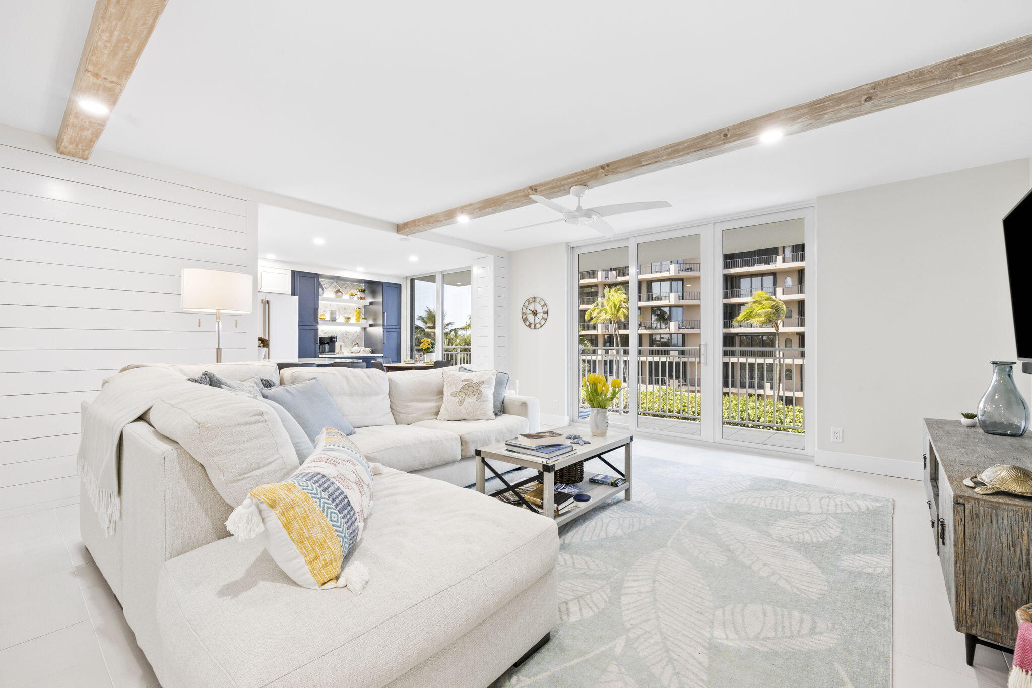 500 Ocean Drive, Unit E3A Juno Beach, FL 33408 - Photo 8 of 28 a living room with furniture and a large window