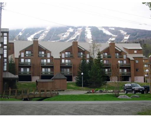 379 Mountain Side Road, Unit 379 Carrabassett Valley, ME 04947 - Photo 1 of 6 Exterior Front.