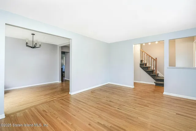 a kitchen with stainless steel appliances granite countertop a stove and a sink