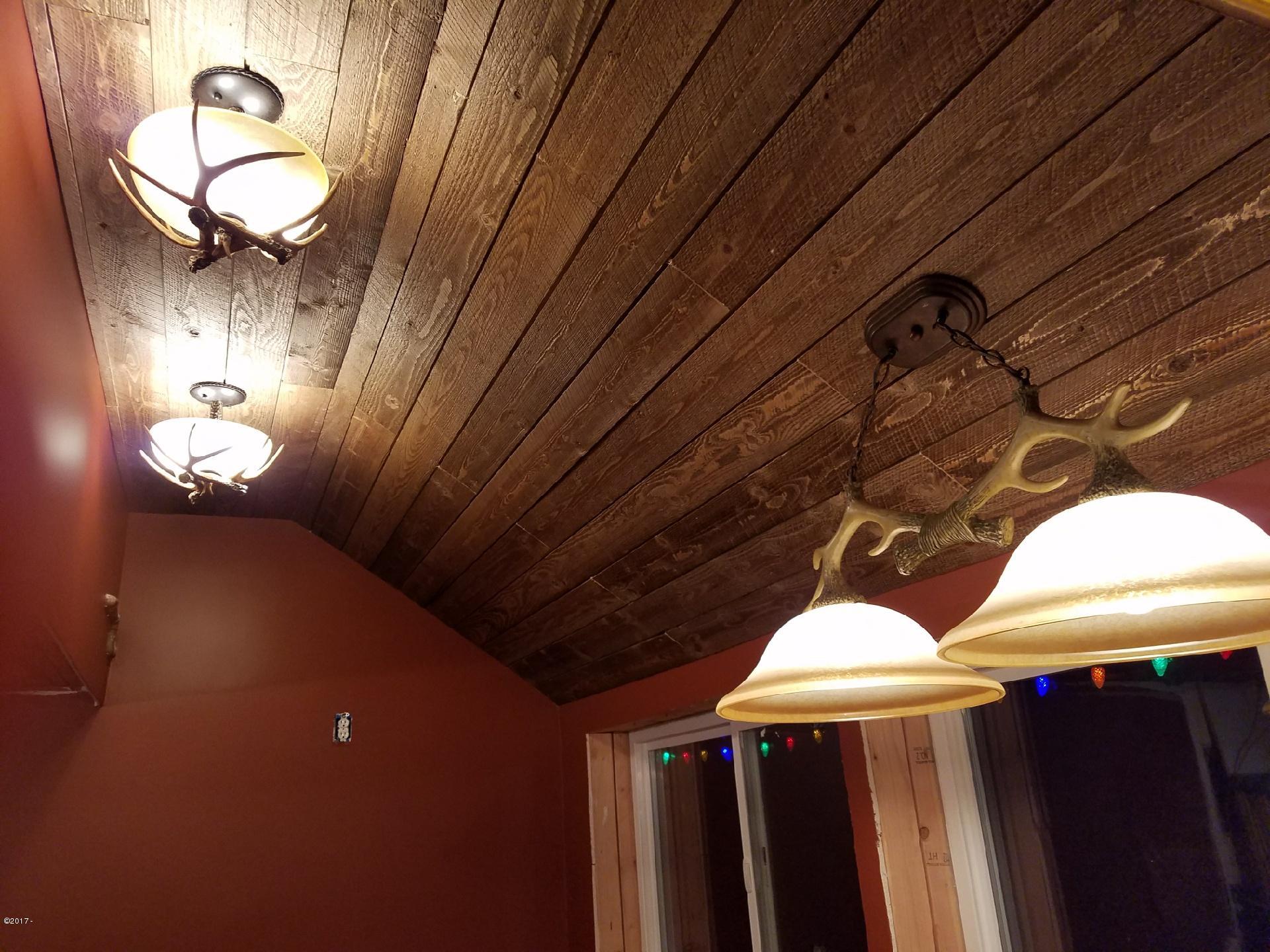 2970 Northeast East Devils Lake Road Otis, OR 97368 - Photo 10 of 12 Artistic lighting throughout the home