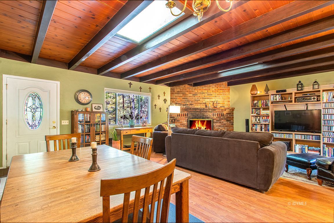 54789 Daryll Road Idyllwild, CA 92549 - Photo 13 of 44 a living room with furniture and a flat screen tv