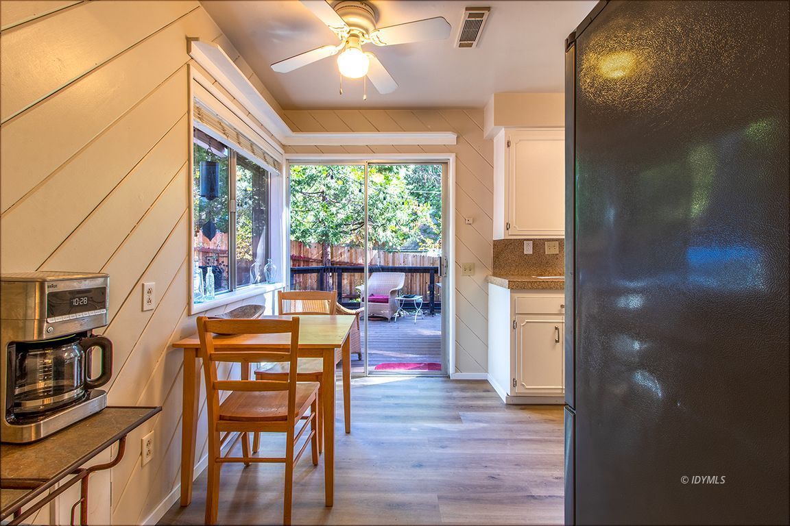54789 Daryll Road Idyllwild, CA 92549 - Photo 17 of 44 a dining room with furniture entryway and wooden floor