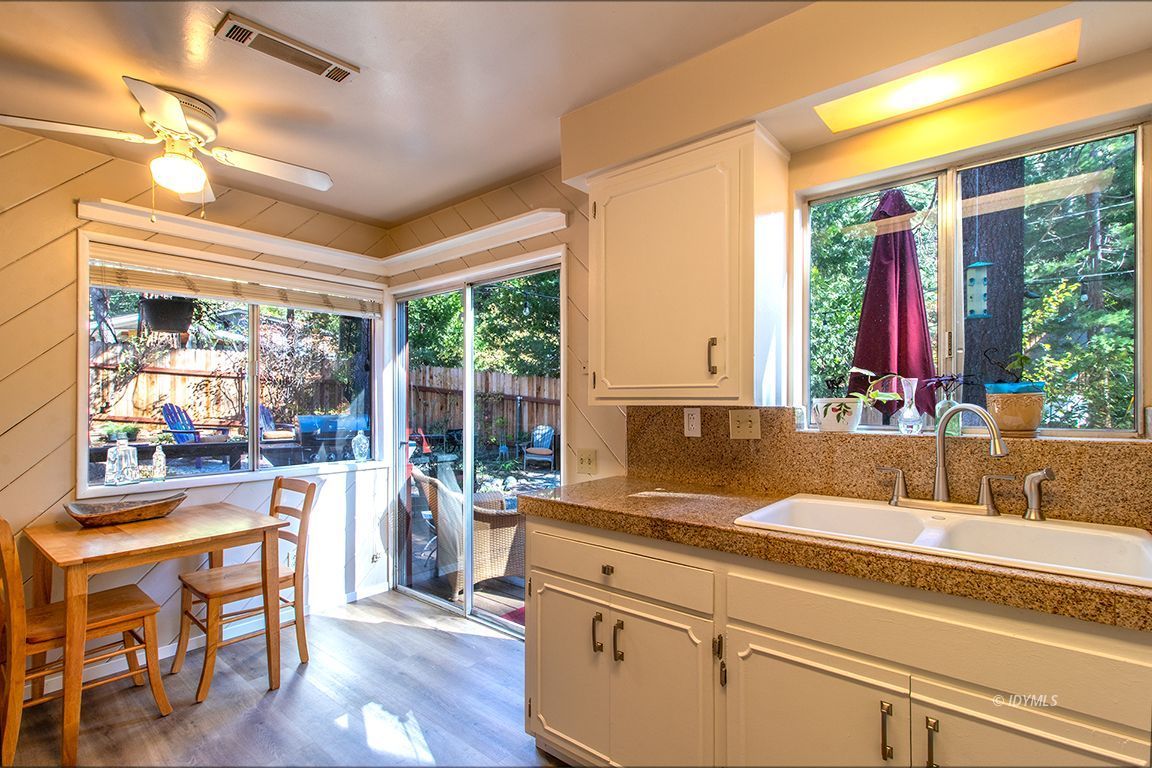 54789 Daryll Road Idyllwild, CA 92549 - Photo 22 of 44 a living room with stainless steel appliances granite countertop furniture and a large window