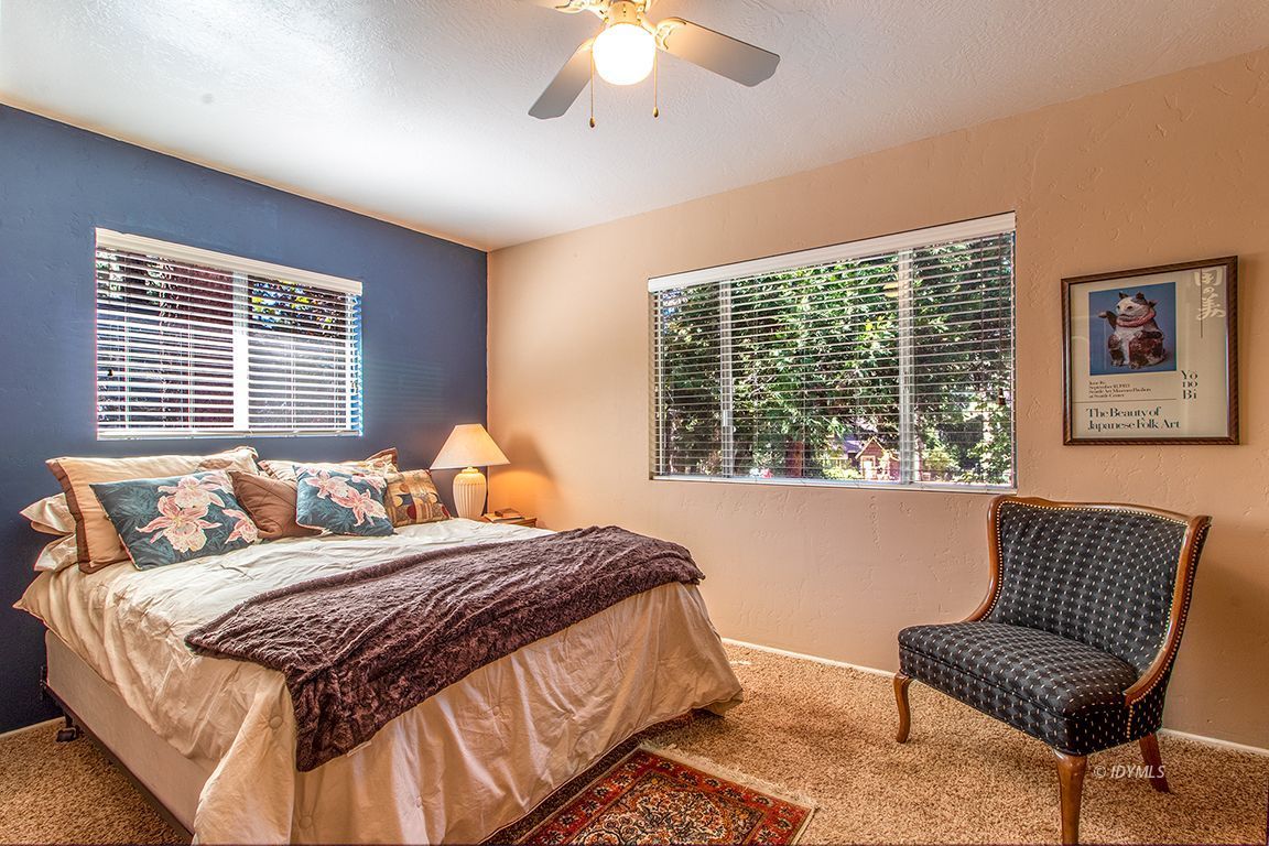 54789 Daryll Road Idyllwild, CA 92549 - Photo 23 of 44 a bedroom with a bed and a couch