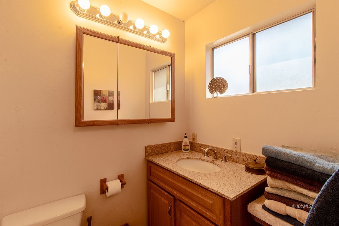 54789 Daryll Road Idyllwild, CA 92549 - Photo 25 of 44 a bathroom with a sink and a mirror