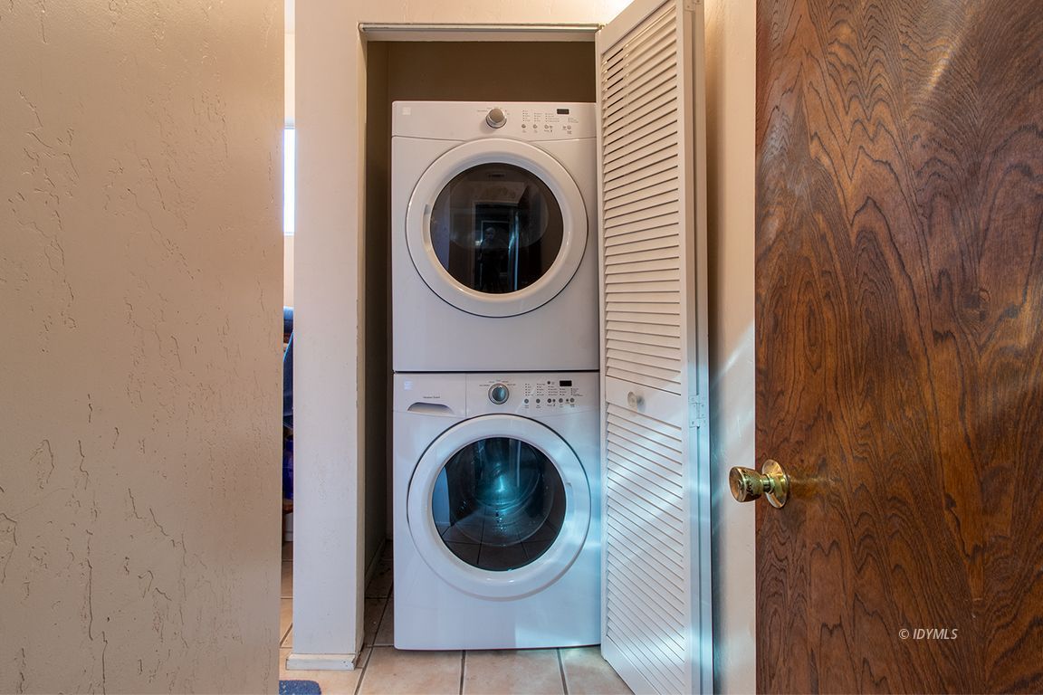 54789 Daryll Road Idyllwild, CA 92549 - Photo 26 of 44 a view of a hallway with washer and dryer