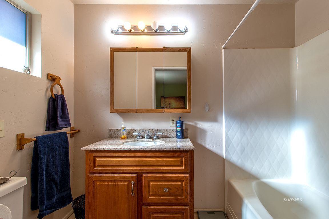 54789 Daryll Road Idyllwild, CA 92549 - Photo 30 of 44 a bathroom with a sink and a mirror