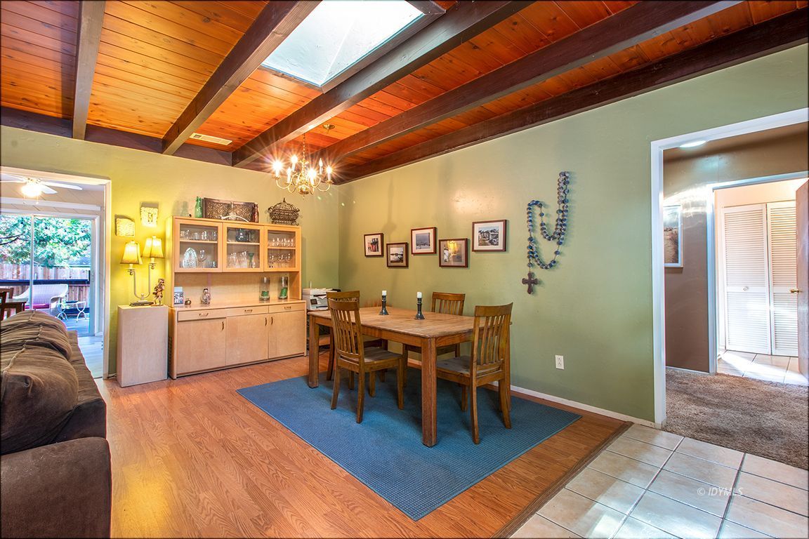 54789 Daryll Road Idyllwild, CA 92549 - Photo 9 of 44 a view of a dining room with furniture window and wooden floor