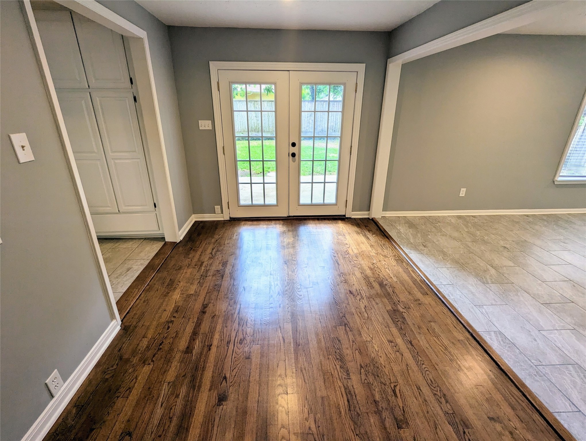 3111 Deal Street Houston, TX 77025 - Photo 20 of 39 a view of an empty room with wooden floor and a window