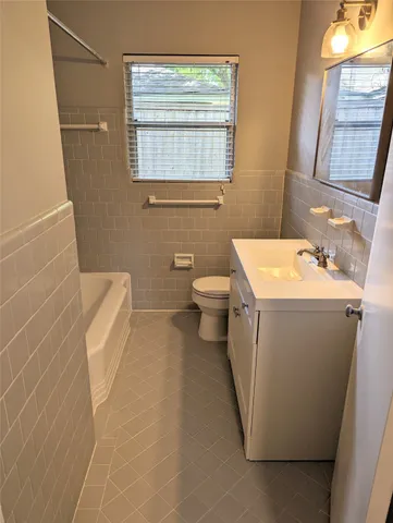 a bathroom with a sink and a toilet
