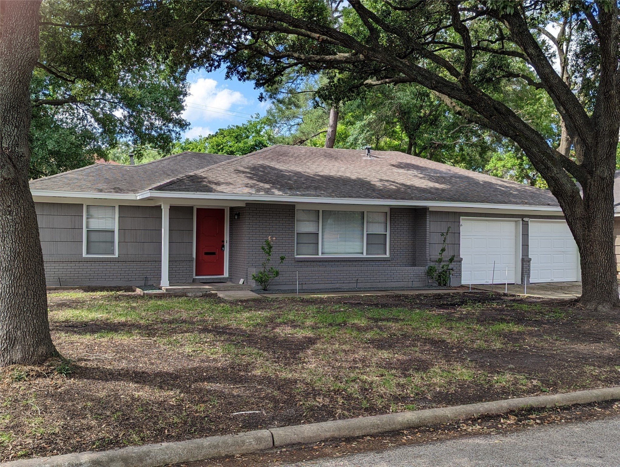 3111 Deal Street Houston, TX 77025 - Photo 3 of 39 a front view of a house with garden