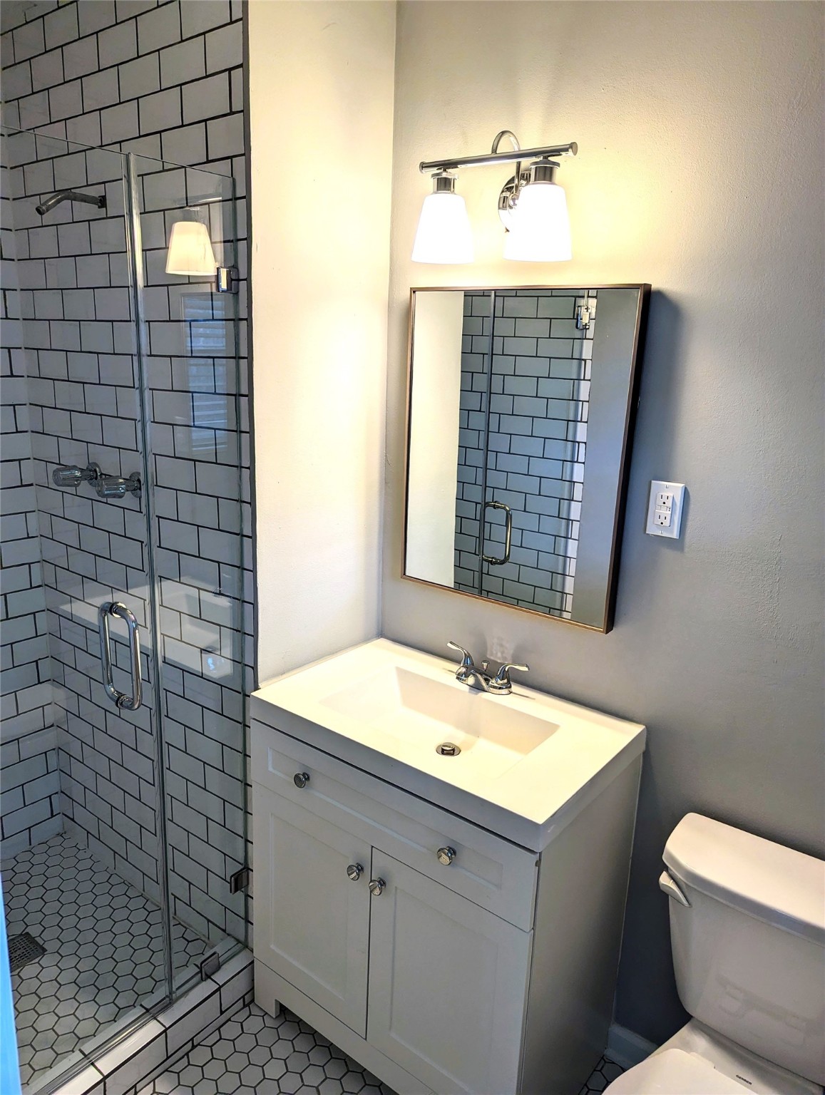 3111 Deal Street Houston, TX 77025 - Photo 36 of 39 a bathroom with a sink toilet and shower