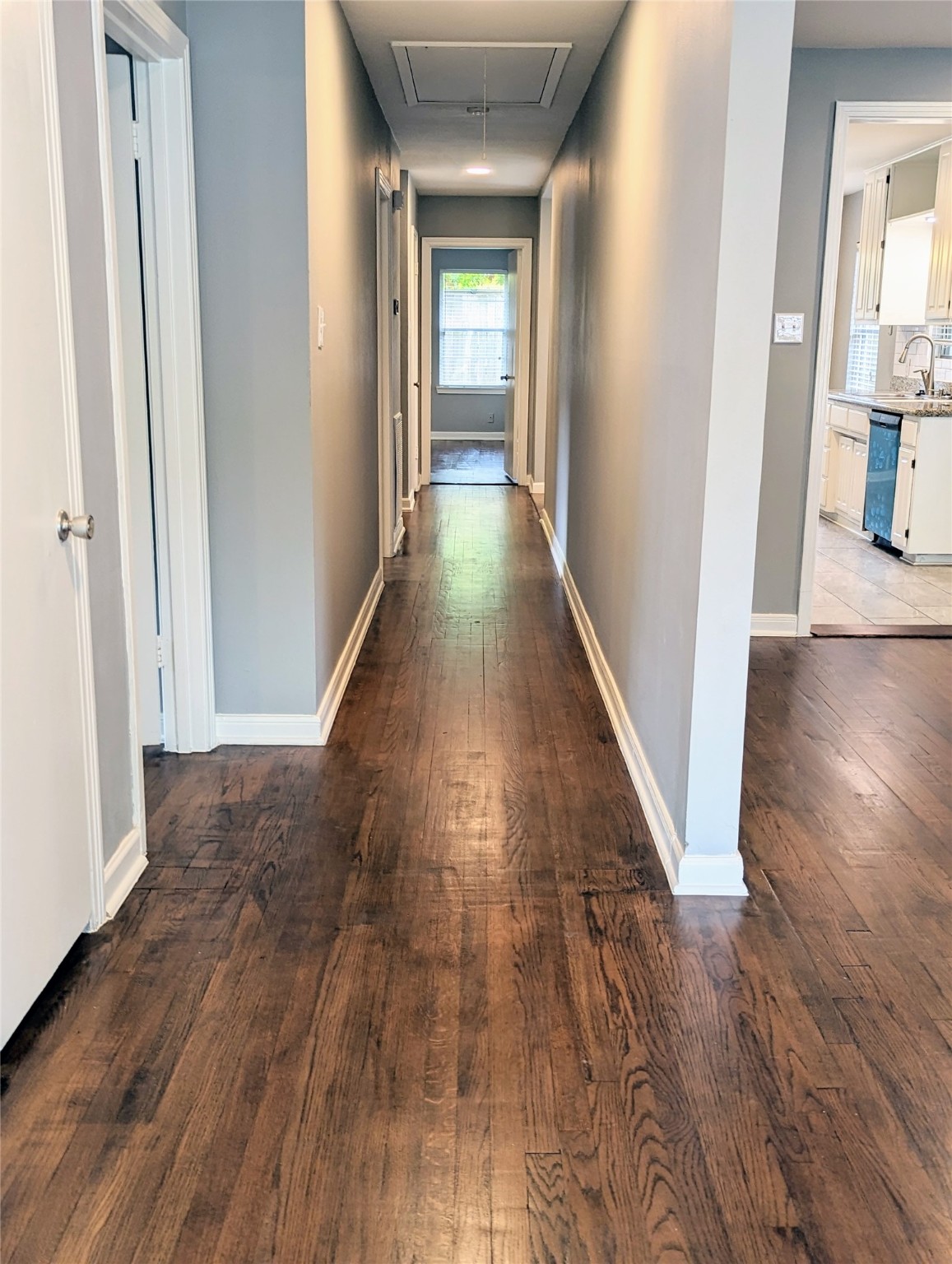 3111 Deal Street Houston, TX 77025 - Photo 5 of 39 a view of a hallway with wooden floor and staircase