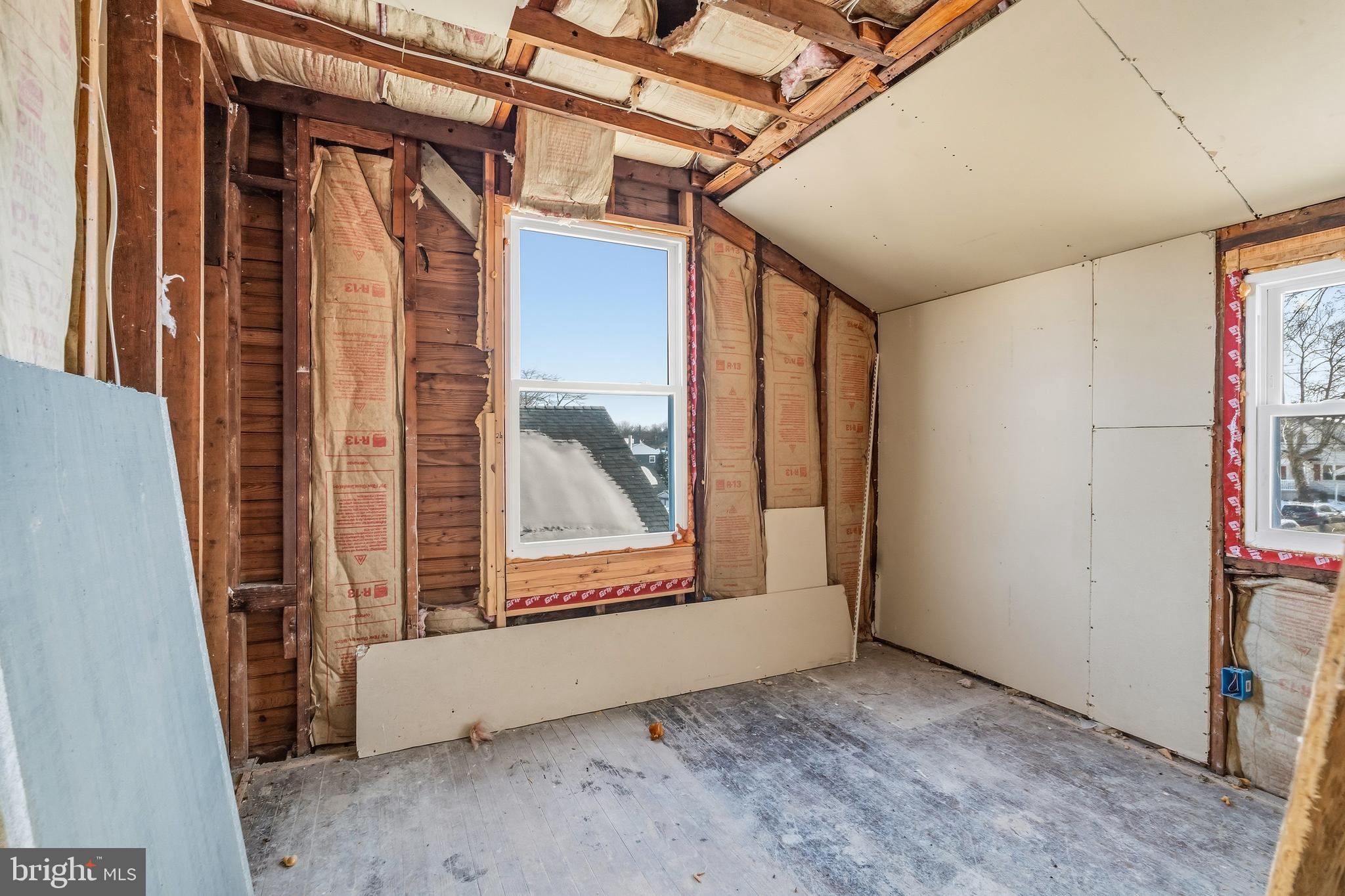 21-23 Harding Avenue Pennsville, NJ 08070 - Photo 27 of 35 a view of a room with wooden floor and a window