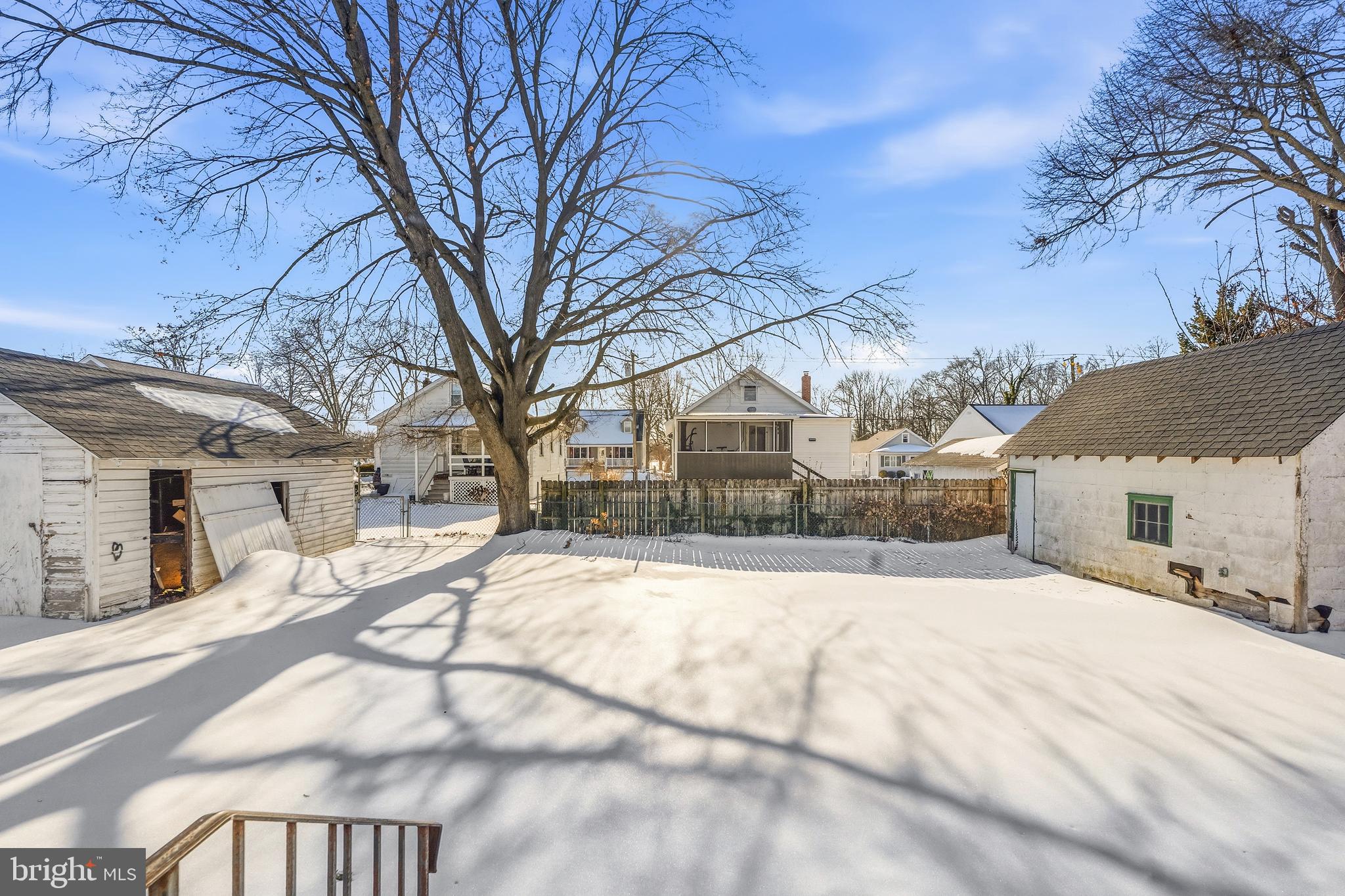 21-23 Harding Avenue Pennsville, NJ 08070 - Photo 34 of 35 a view of a white house with a yard