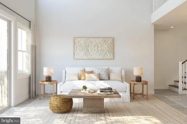 a living room with furniture and a lamp