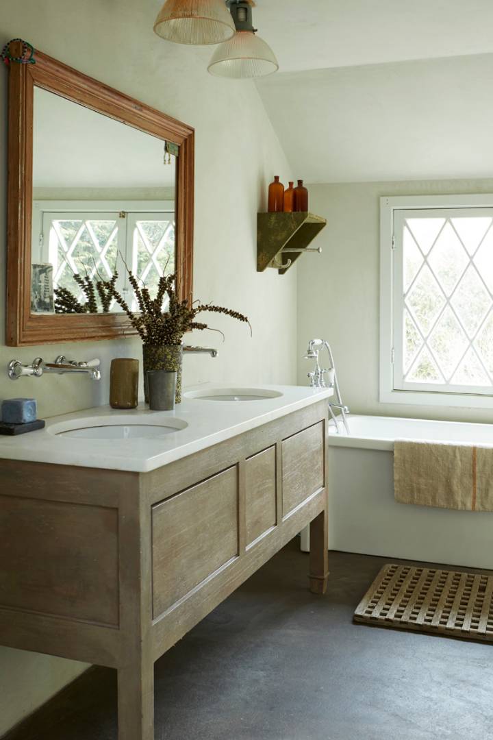 56 Sagaponack Road Bridgehampton, NY 11932 - Photo 12 of 15 a bathroom with a sink and a mirror