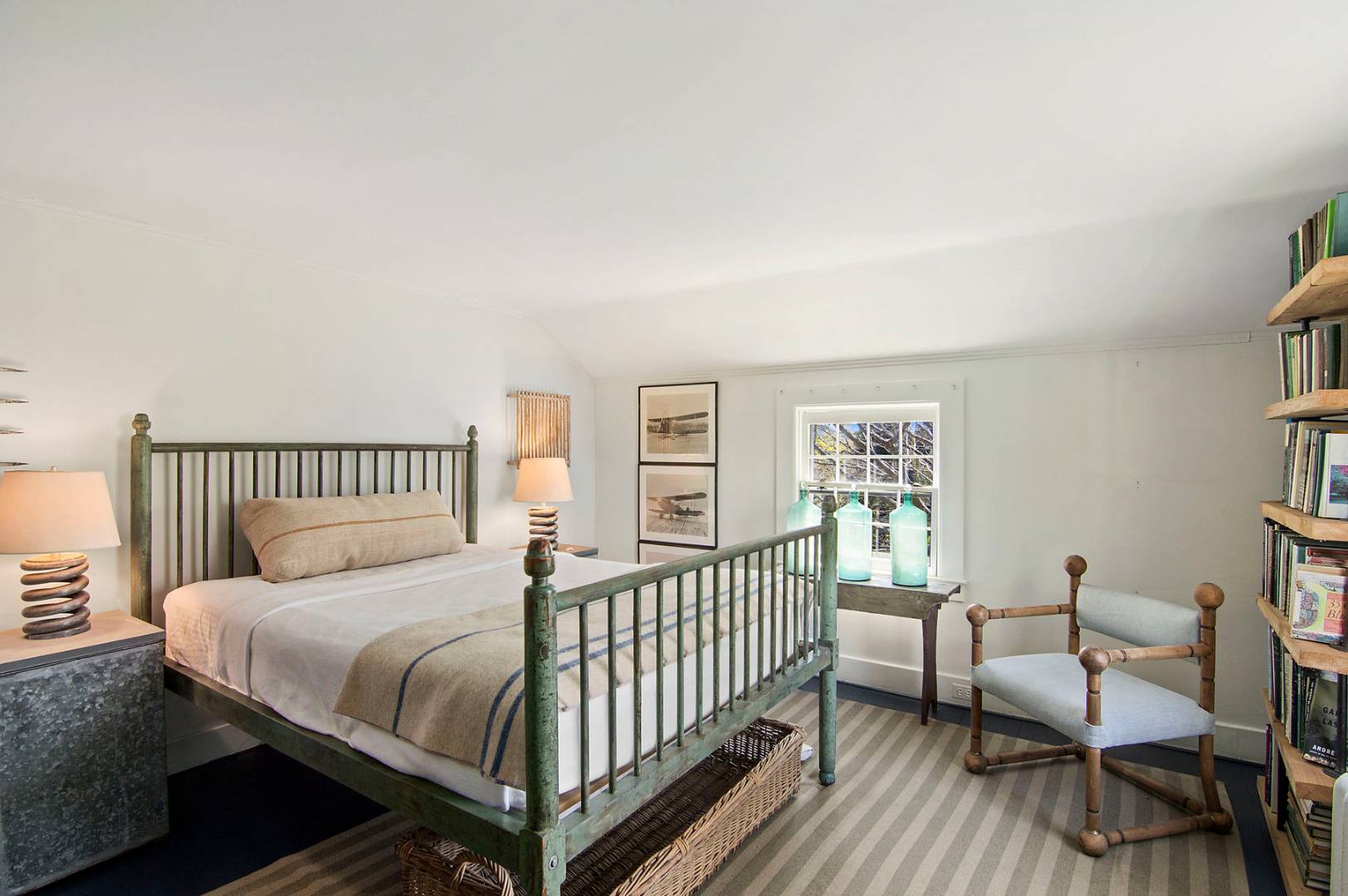 56 Sagaponack Road Bridgehampton, NY 11932 - Photo 9 of 15 a bedroom with a bed and a window