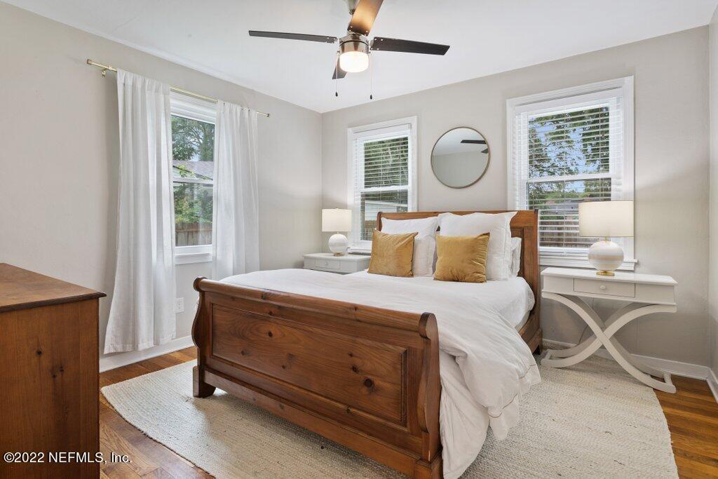 1499 Birmingham Road South Jacksonville, FL 32207 - Photo 13 of 51 a bedroom with a bed a dresser and window