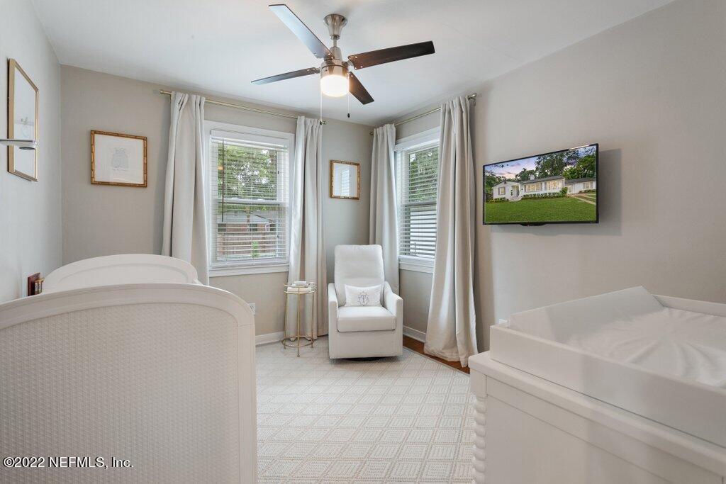 1499 Birmingham Road South Jacksonville, FL 32207 - Photo 17 of 51 a living room with furniture and a flat screen tv