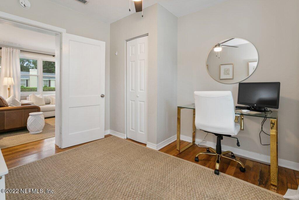 1499 Birmingham Road South Jacksonville, FL 32207 - Photo 22 of 51 a view of a livingroom with furniture and a flat screen tv