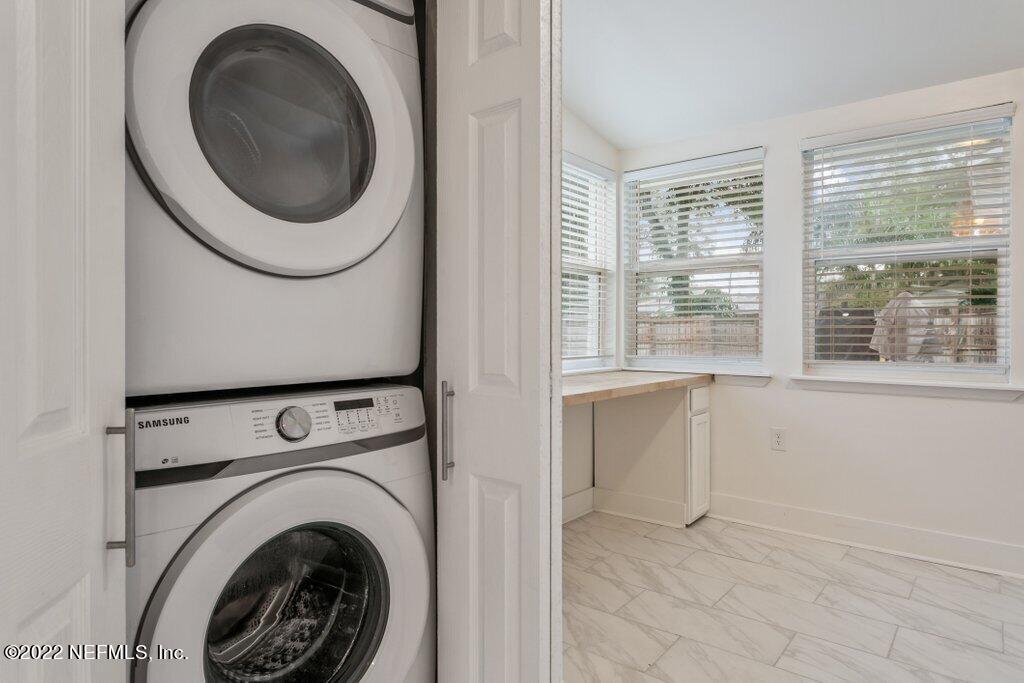 1499 Birmingham Road South Jacksonville, FL 32207 - Photo 35 of 51 a utility room with sink dryer and washer