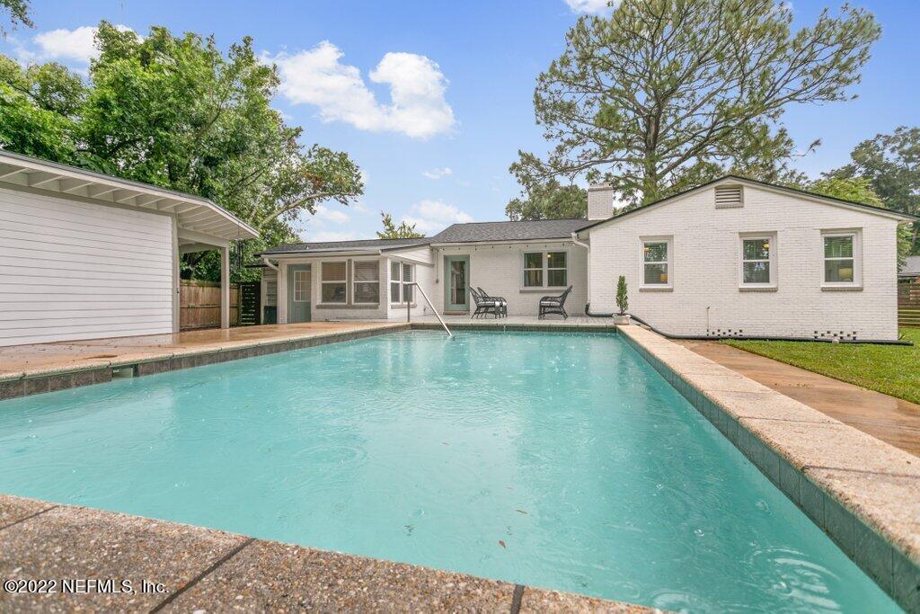 1499 Birmingham Road South Jacksonville, FL 32207 - Photo 42 of 51 a view of a house with pool and a yard