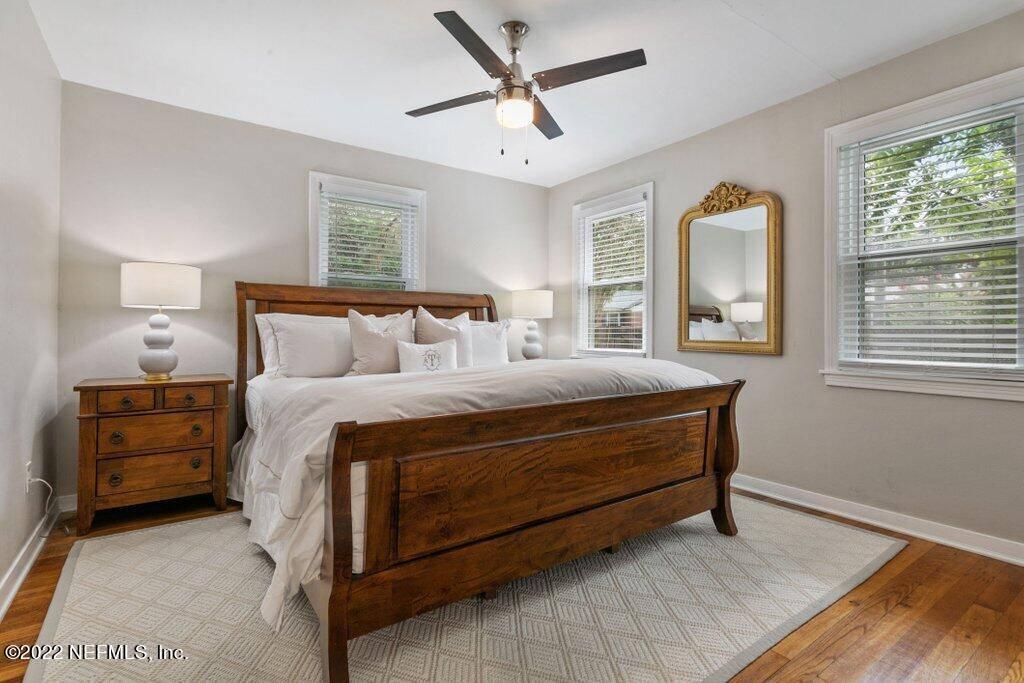 1499 Birmingham Road South Jacksonville, FL 32207 - Photo 8 of 51 a bedroom with a bed and a dresser next to a window