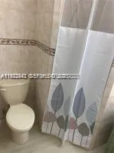 a close view of a toilet in a bathroom