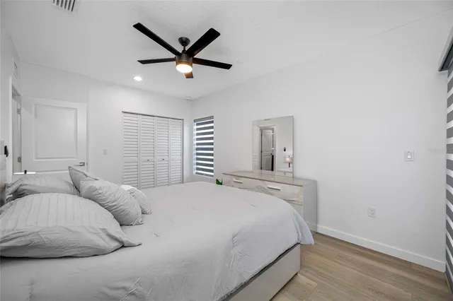 a bathroom with a shower and a toilet