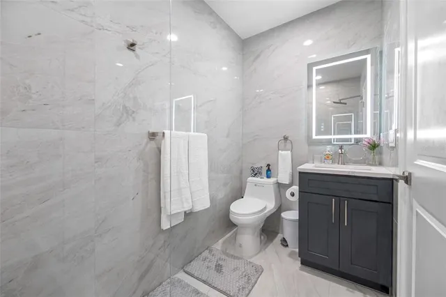 a bedroom with bed and a window