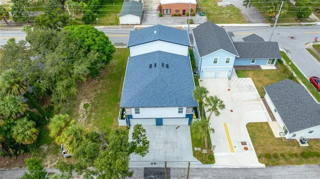 a view of a patio with a table and chairs