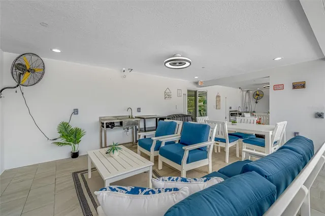 a view of a chairs and table in a patio