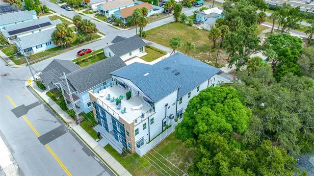 an aerial view of residential building with outdoor space