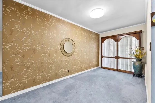 a view of a livingroom with a staircase