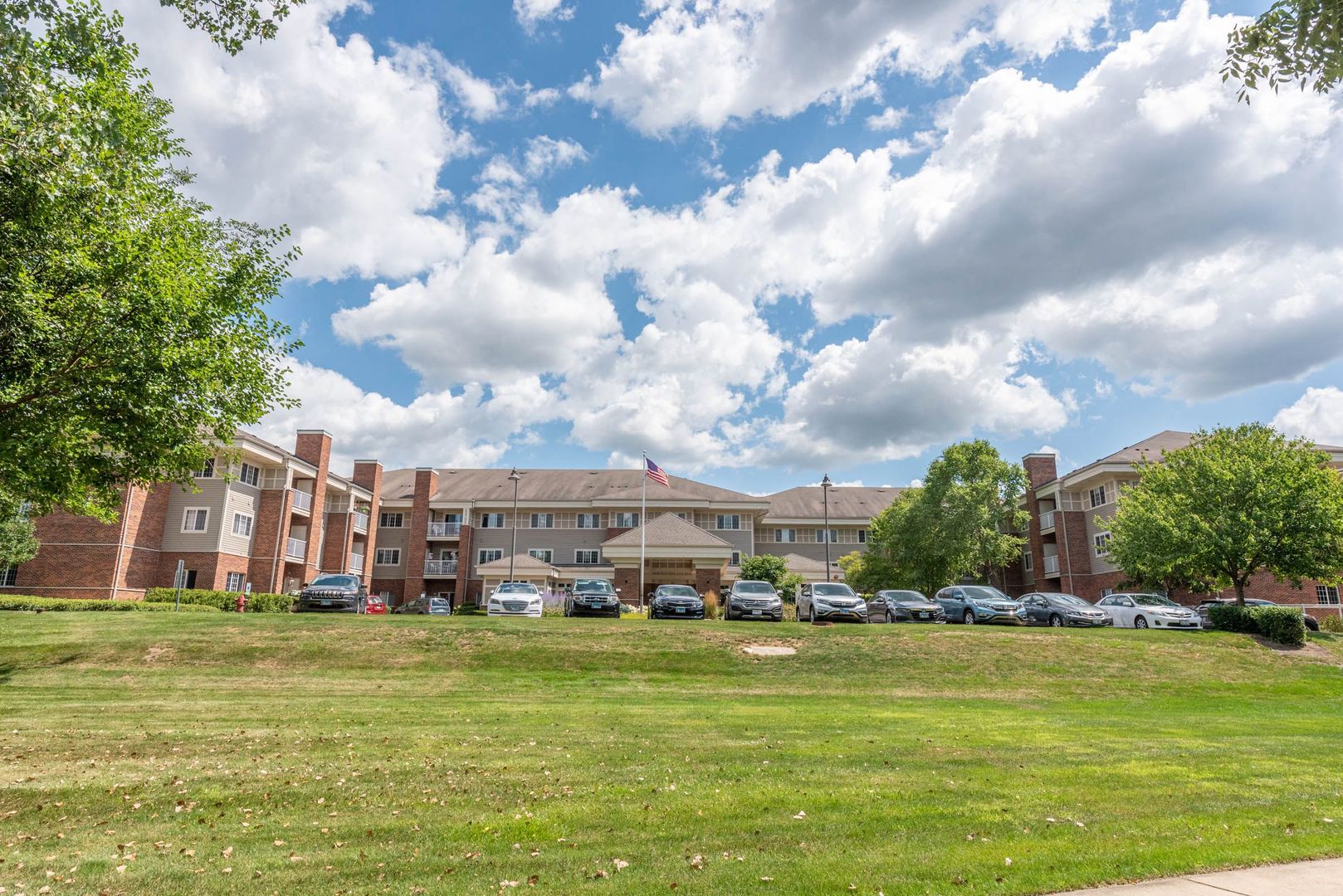 801 North McLean Boulevard, Unit 300 Elgin, IL 60123 - Photo 11 of 16 a view of a lake with a house in the background