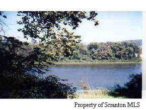 92 Route Falls, PA 18615 - Photo 3 of 6 a view of a lake