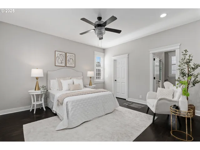 a bed room with a bed and a chair