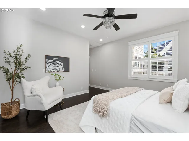 a bedroom with a bed furniture and a window