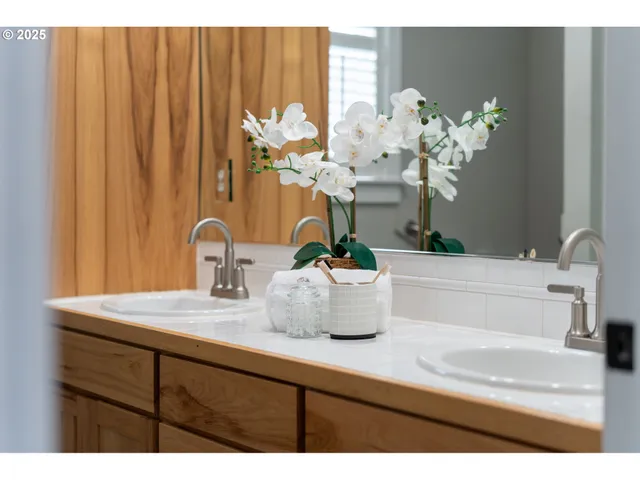 a bathroom sink with a mirror