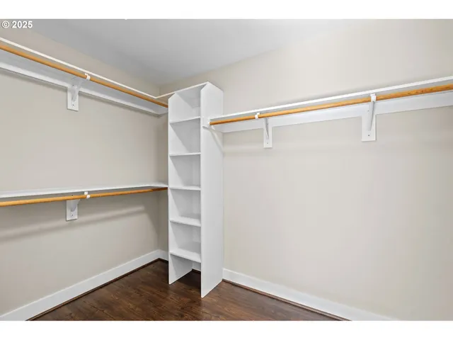 a view of an empty walk in closet