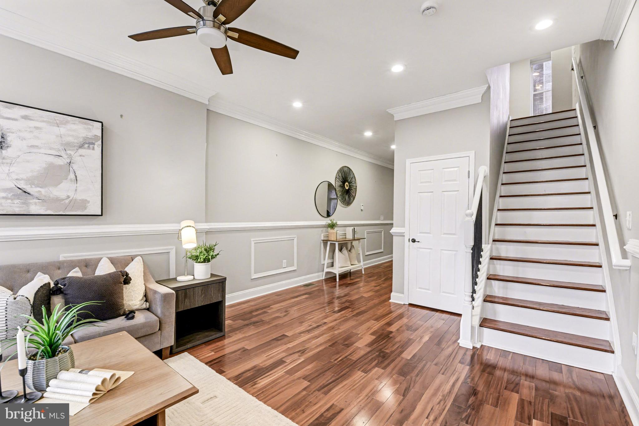 1431 Madison Avenue Baltimore, MD 21217 - Photo 1 of 38 a living room with furniture