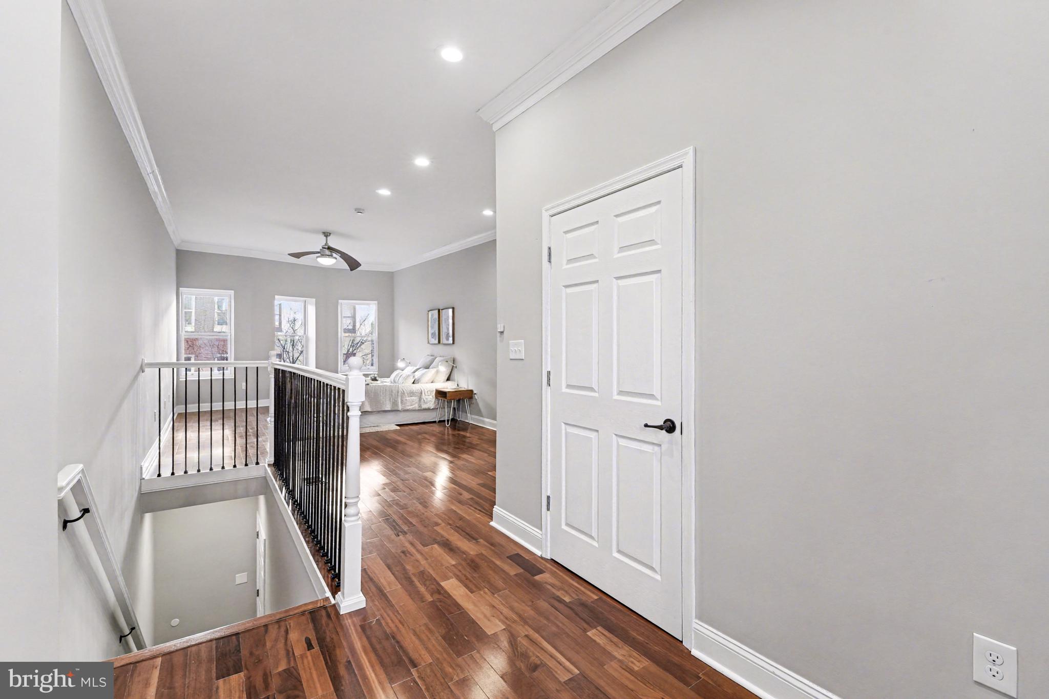 1431 Madison Avenue Baltimore, MD 21217 - Photo 23 of 38 wooden floor and dining room with wooden floor